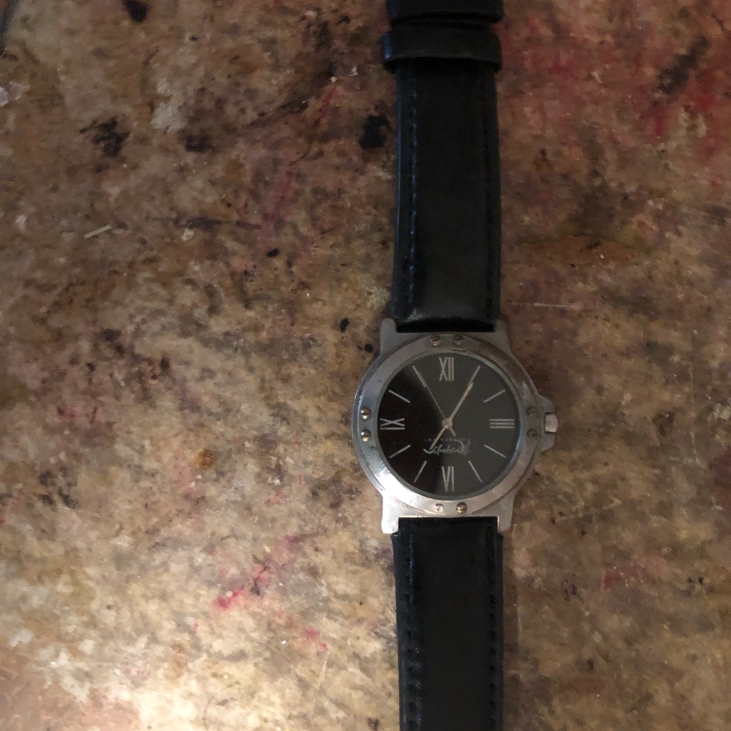 Black Leather Strap Watch With Silver Case
